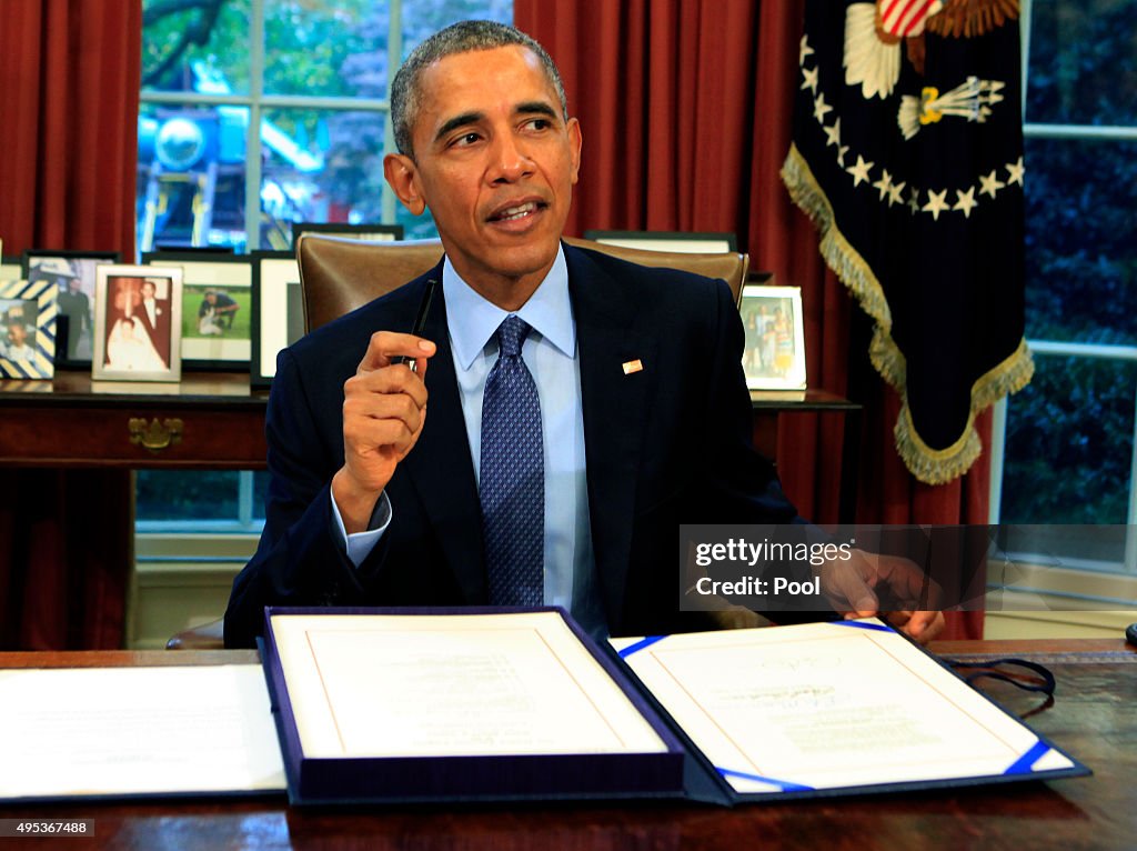 Obama signs bipartisan budget bill 2015 into law