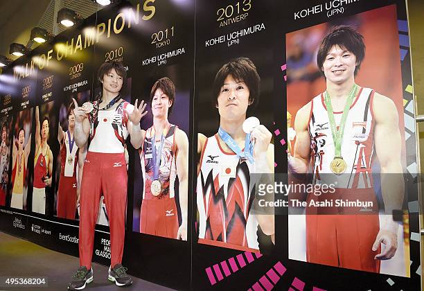 Kohei Uchimura of Japan stands in the Walk of Champions and shows his sixth World Artistic Gymnastics Championships gold medal after day eight of the...
