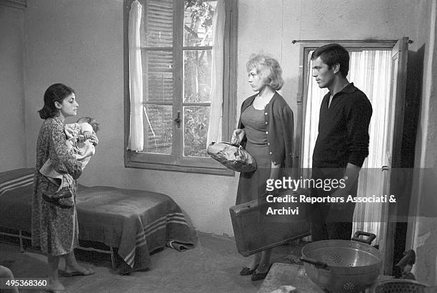 Italian actor Franco Citti with the actress Franca Pasut in a scene from the film Accattone. 1961