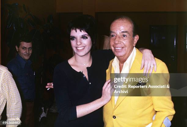 American singer and actress Liza Minnelli posing smiling with her father and American director Vincente Minnelli . Rome, October 1975