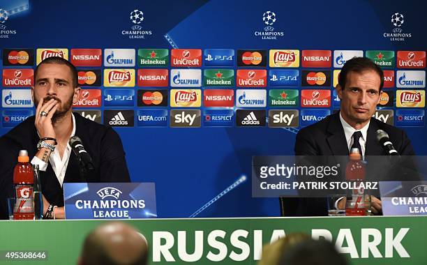 Juventus' head coach Massimiliano Allegri and Juventus' defender Leonardo Bonucci address a press conference on the eve of the Group D, second-leg...