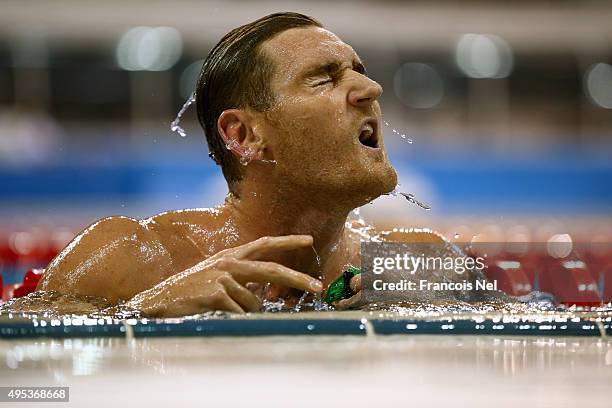 Cameron Van Der Burgh of South Africa celebrates after winning Men's 50m Breastroke final during day one of the FINA World Swimming Cup 2015 at the...