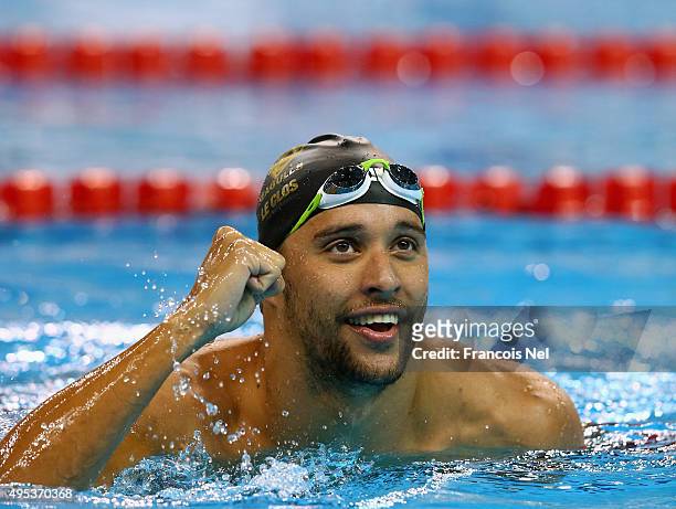 Chad Le Clos of South Africa celebrates after winning the Men's 200m Butterfly final during day one of the FINA World Swimming Cup 2015 at the Hamad...