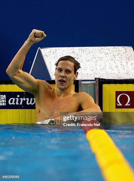 Mitchell Larkin of Australia celebrates after winning the Men's 100m Backstroke final during day one of the FINA World Swimming Cup 2015 at the Hamad...