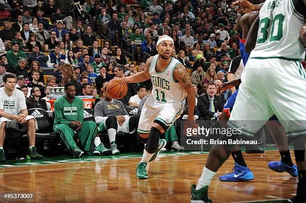 Jerryd Bayless of the Boston Celtics dribbles the ball against the Philadelphia 76ers on April 4, 2014 at the TD Garden in Boston, Massachusetts....