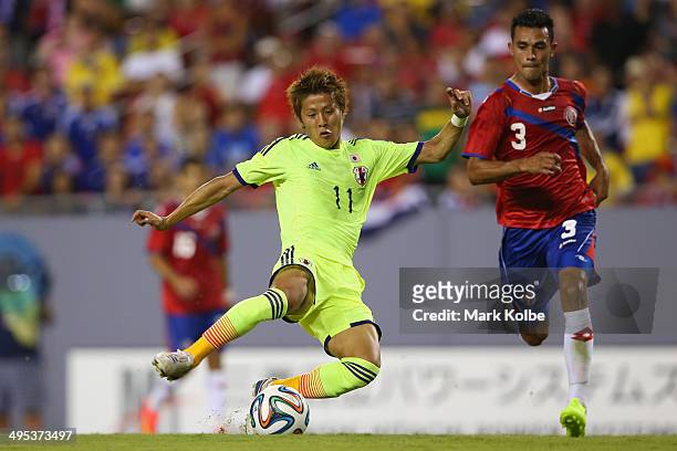 Yoichiro Kakitani of Japan scores a goal during the International Friendly Match between Japan and Costa Rica at Raymond James Stadium on June 2,...
