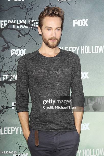 Tom Mison arrives at Fox's "Sleepy Hollow" special screening held at Hollywood Forever on June 2, 2014 in Hollywood, California.