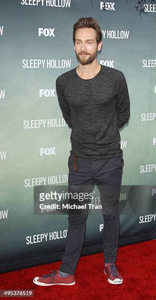 Tom Mison arrives at Fox's "Sleepy Hollow" special screening held at Hollywood Forever on June 2, 2014 in Hollywood, California.