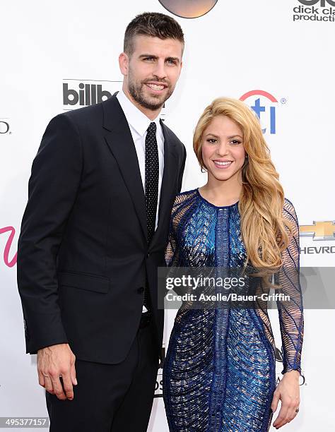 Singer Shakira and Gerard Pique arrive at the 2014 Billboard Music Awards at the MGM Grand Garden Arena on May 18, 2014 in Las Vegas, Nevada.