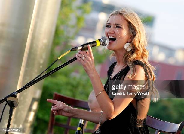 Sarah Darling performs at the CMT One Country & Dentastix Smile! Party on June 2, 2014 in Nashville, Tennessee.