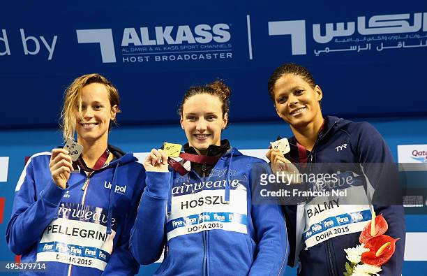Fedirica Pellegrini of Italy, Katinka Hosszu of Hungary and Coralie Balmy of France celebrates on the podium after the Women's 200m Freestyle during...