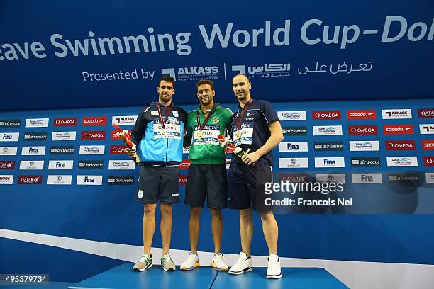 Federico Grabich of Argentina, Chad Le Clos of South Africa and and Jeremy Stravius of France celebrates on the podium after the Men's 100m Freestyle...