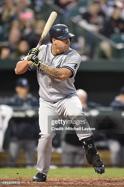 Gary Sanchez of the New York Yankees prepares for a pitch during a baseball game against the Baltimore Orioles at Oriole Park at Camden Yards on...