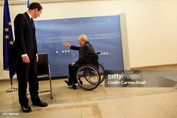 German Finance Minister Wolfgang Schaeuble and British Chancellor of the Exchequer George Osborne attend for a photo call upon Osborne's arrival at...