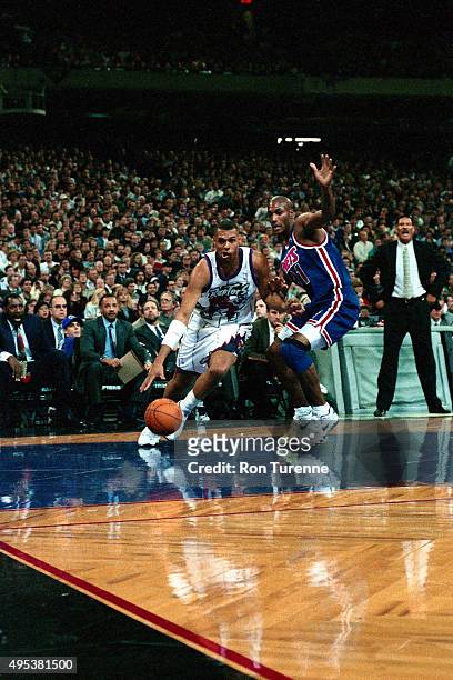 Tracy Murray of the Toronto Raptors drives against the New Jersey Nets on November 3, 1995 at the Toronto SkyDome on November 3, 1995 in Toronto,...