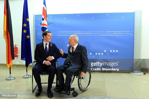 Wolfgang Schauble, Germany's finance minister, right, speaks with George Osborne, U.K. Chancellor of the exchequer, at the ministry of finance in...