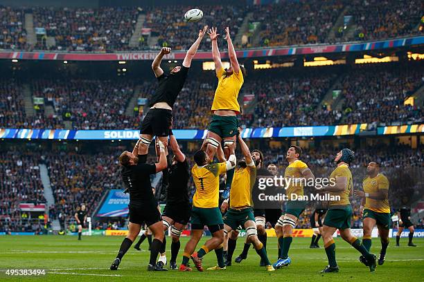 Brodie Retallick of New Zealand and Michael Hooper of Australia compete for lineout ball during the 2015 Rugby World Cup Final match between New...