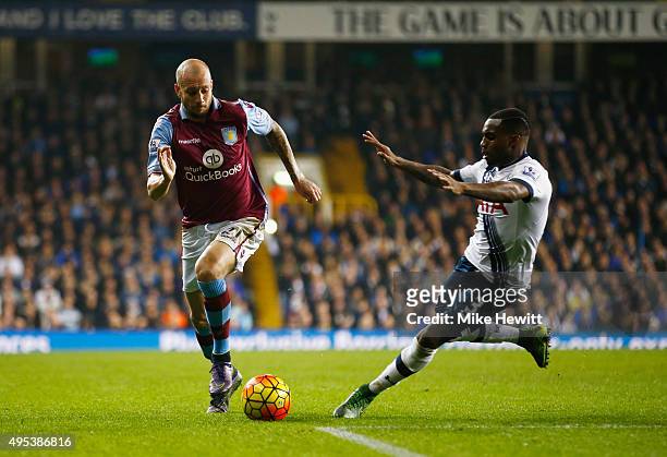 Alan Hutton of Aston Villa takes on Danny Rose of Tottenham Hotspur during the Barclays Premier League match between Tottenham Hotspur and Aston...