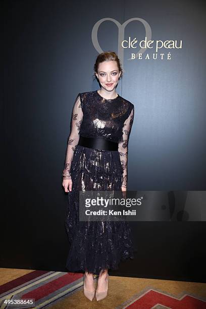 Actress Amanda Seyfried poses for photo as she attends 'Cle de peau BEAUTE 2014' promotional event at the Ritz Carlton Tokyo on June 2, 2014 in...