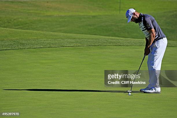 Graham DeLaet of Canada uses his putter to sink the putt during the second round of the Shriners Hospitals For Children Open on October 23, 2015 at...