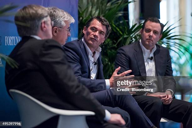 Gavin Patterson, chief executive officer of BT Group PLC, second right, speaks as Hubert Joly, chairman and chief executive officer of Best Buy Co....