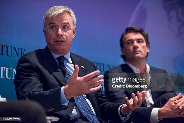 Hubert Joly, chairman and chief executive officer of Best Buy Co. Inc., left, speaks as Gavin Patterson, chief executive officer of BT Group PLC,...