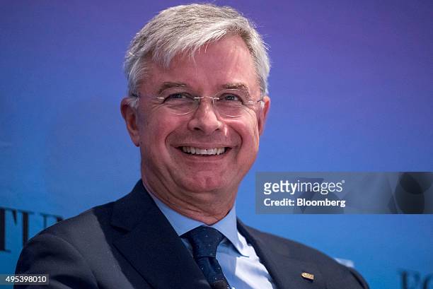 Hubert Joly, chairman and chief executive officer of Best Buy Co. Inc., laughs during the 2015 Fortune Global Forum in San Francisco, California,...