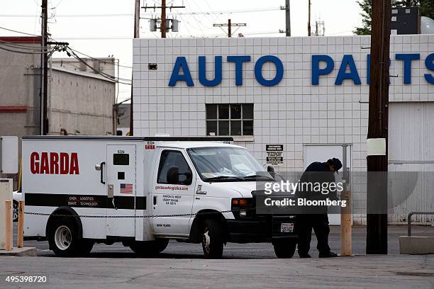 Garda Cash Logistics truck arrives at a Bank of America Corp. Branch location, near non-ATM banking services, in Calexico, California, U.S., on...