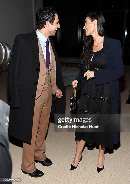 Designer Zac Posen and actress Demi Moore attend the 12th annual CFDA/Vogue Fashion Fund Awards at Spring Studios on November 2, 2015 in New York...