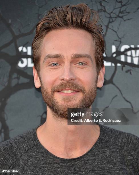 Actor Tom Mison arrives to a special screening of Fox's "Sleepy Hollow" at Hollywood Forever on June 2, 2014 in Hollywood, California.
