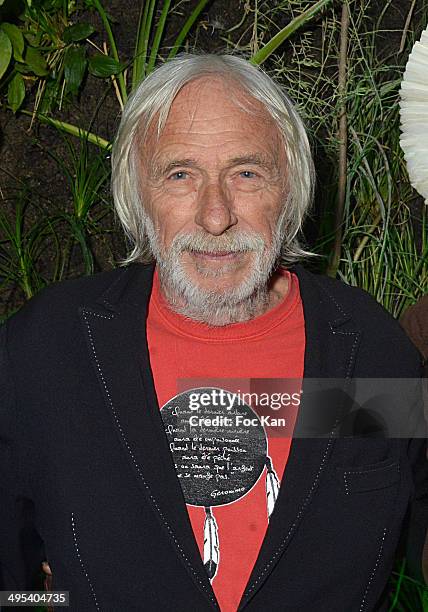 Actor Pierre Richard poses in front of the botanical wall by green architect Patrick Blanc during the 'France Amazonie Association' Dinner At...