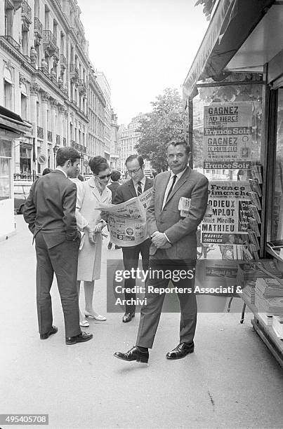 American actor Glenn Ford walking with his wife and American actress Kathryn Hays. Paris, 1966