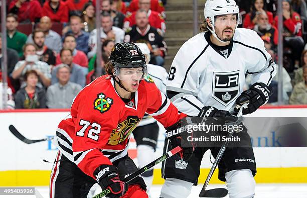 Artemi Panarin of the Chicago Blackhawks and Drew Doughty of the Los Angeles Kings watch for the puck in the first period of the NHL game at the...