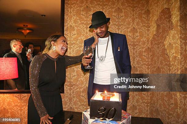 La La Anthony and Carmelo Anthony attend Carmelo Anthony's '30 for 30' Birthday Dinner at The NoMad Hotel on June 2, 2014 in New York City.