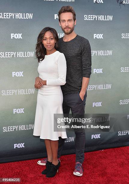 Actors Nicole Beharie and Tom Mison arrive to a special screening of Fox's "Sleepy Hollow" at Hollywood Forever on June 2, 2014 in Hollywood,...