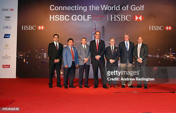 Aref Al Awani, , Kyi Hla Han , Tim Finchem , Giles Morgan , Keith Pelley , Martin Slumbers and Guy Kinnings pose for a photograph following the HSBC...