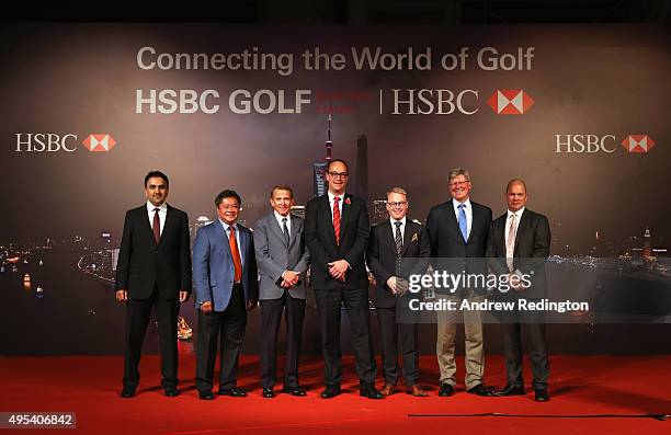 Aref Al Awani, , Kyi Hla Han , Tim Finchem , Giles Morgan , Keith Pelley , Martin Slumbers and Guy Kinnings pose for a photograph following the HSBC...