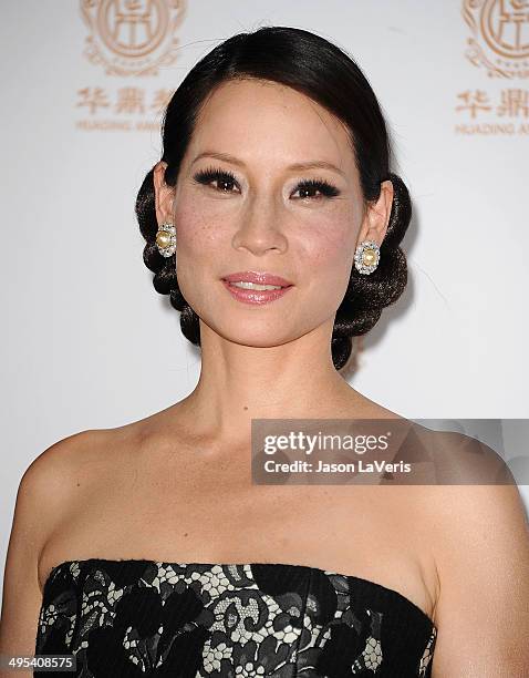 Actress Lucy Liu poses in the press room at the 2014 Huading Film Awards at The Montalban on June 1, 2014 in Hollywood, California.