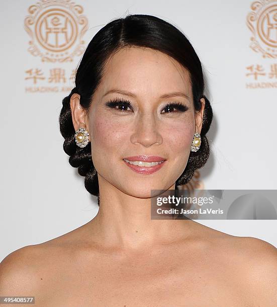 Actress Lucy Liu poses in the press room at the 2014 Huading Film Awards at The Montalban on June 1, 2014 in Hollywood, California.