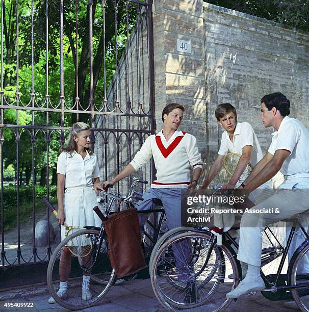 Italian actor Lino Capolicchio riding a bicycle in a scene from the film The Garden of the Finzi-Continis. Italy, 1970