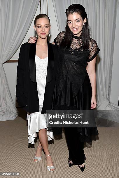 Actress Amanda Seyfried and musician Lorde attend the 12th annual CFDA/Vogue Fashion Fund Awards at Spring Studios on November 2, 2015 in New York...