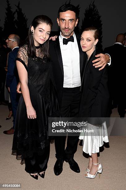 Lorde, Riccardo Tisci, and Amanda Seyfried attend the 12th annual CFDA/Vogue Fashion Fund Awards at Spring Studios on November 2, 2015 in New York...