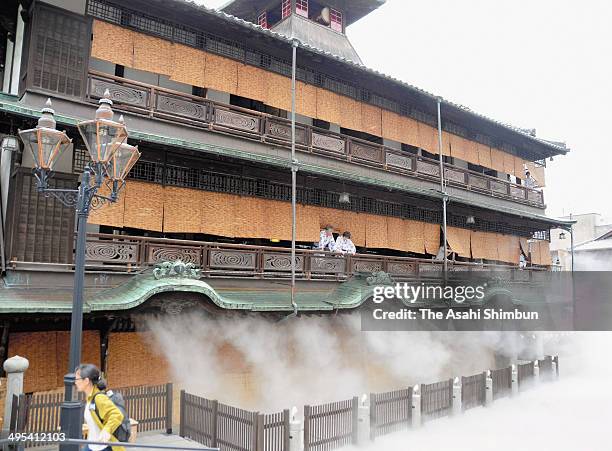 Cooling mist splash from the Dogo Onsen Main Hall where the bamboo blinds are hung, on June 2, 2014 in Matsuyama, Ehime, Japan.