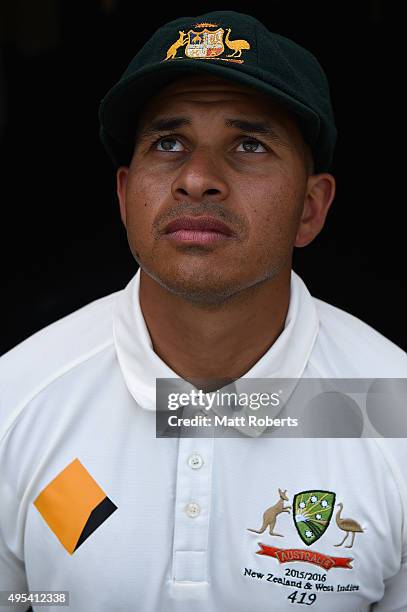 Usman Khawaja of Australia poses during a portrait session at The Gabba on November 3, 2015 in Brisbane, Australia.