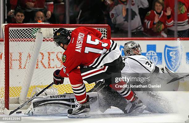 Artem Anisimov of the Chicago Blackhawks scores a short-handed goal against Jonathan Quick of the Los Angeles Kings in the third period at the United...