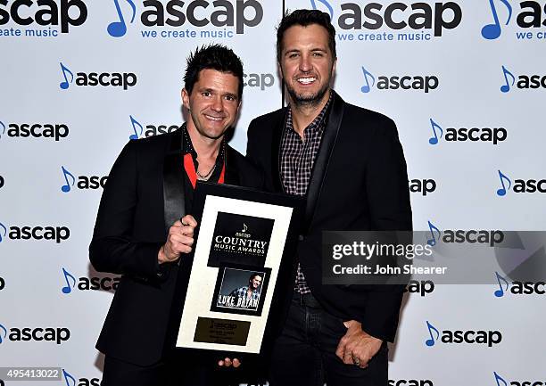 Songwriter Michael Carter and Luke Bryan attend the 53rd annual ASCAP Country Music awards at the Omni Hotel on November 2, 2015 in Nashville,...