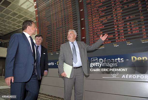 French airport operator Aeroports de Paris CEO Augustin de Romanet , and the Head of French Railway Infrastructure , Jacques Rapoport listens to...