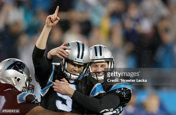 Graham Gano of the Carolina Panthers celebrates the game winning field goal, defeating the Indianapolis Colts 29-26 at Bank of America Stadium on...