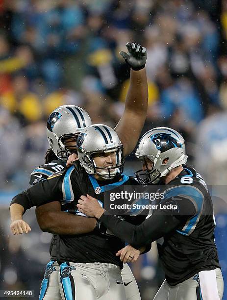 Graham Gano of the Carolina Panthers celebrates the game winning field goal, defeating the Indianapolis Colts 29-26 at Bank of America Stadium on...