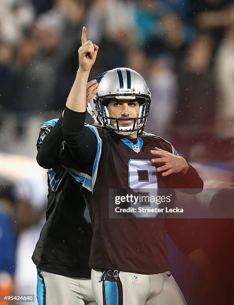 Graham Gano of the Carolina Panthers celebrates the game winning field goal, defeating the Indianapolis Colts 29-26 at Bank of America Stadium on...